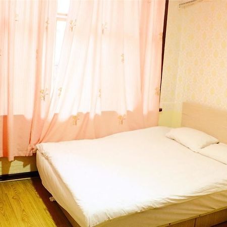 Qingdao Peninsula Four Seasons Business Hotel מראה חיצוני תמונה