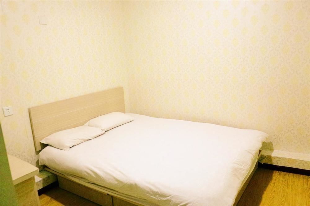Qingdao Peninsula Four Seasons Business Hotel מראה חיצוני תמונה