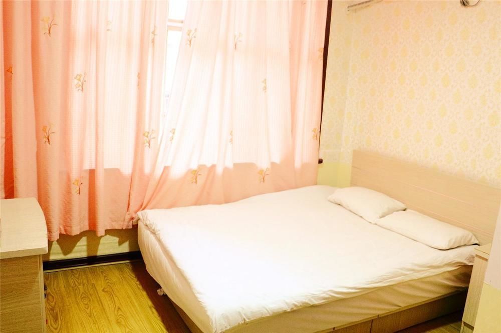 Qingdao Peninsula Four Seasons Business Hotel מראה חיצוני תמונה