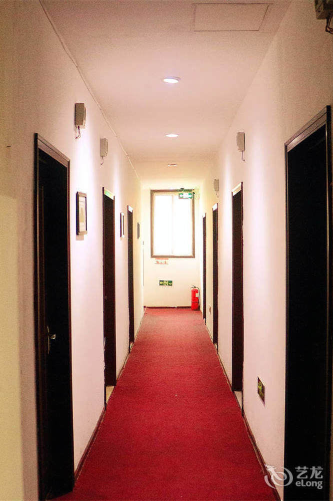 Qingdao Peninsula Four Seasons Business Hotel מראה חיצוני תמונה
