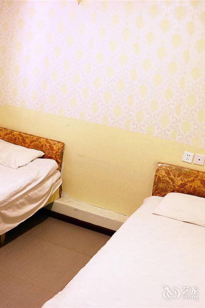 Qingdao Peninsula Four Seasons Business Hotel מראה חיצוני תמונה