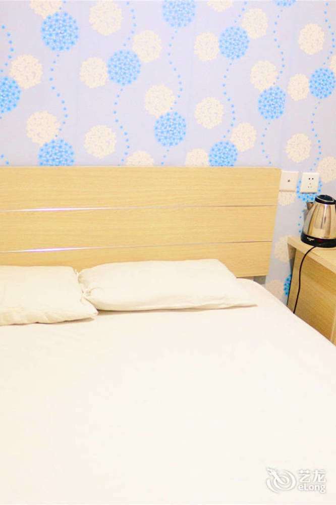 Qingdao Peninsula Four Seasons Business Hotel מראה חיצוני תמונה
